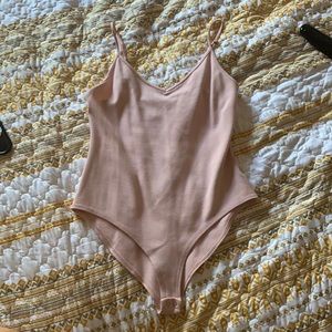 Forever 21 size medium pink body suit